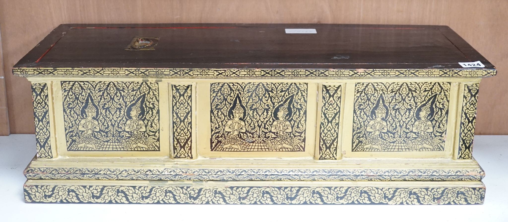 A Thai Buddhist sutra holder, 67 cms wide x 21 cms high.